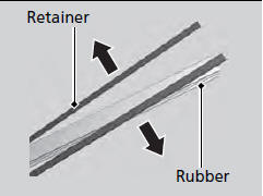 4. Remove the retainers from wiper blade and