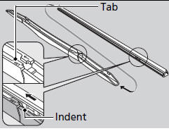 6. Slide the new wiper blade onto the holder