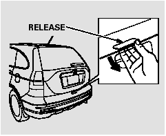 To open the tailgate, push the release, and lift up. To close the tailgate, use