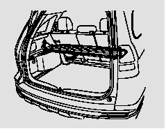 To remove the dual deck cargo shelf, fold up the rear half of the shelf forward