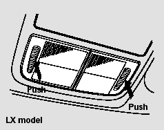 Turn on the spotlight by pushing the lens. Push the lens again to turn it off.