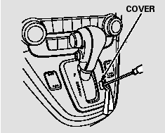 4. Insert the key in the shift lock release slot.