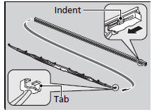 5. Slide the new wiper blade onto the holder from the bottom end.