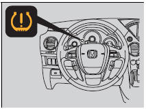 Monitors the tire pressure while you are driving. If your vehicle's tire pressure