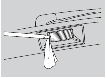 1. Remove the lens by prying on the edge of the lens using a flat-tip screwdriver.