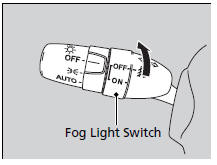 When the low beam headlights are on, turn the fog light switch on to use the