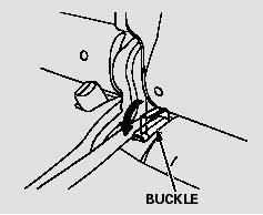 1. Push the seat belt buckles into the seat cushion.